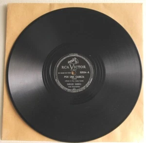 CARLOS GARDEL Rca Vic 32534 BRAZIL 78 POR UNA CABEZA /LOS OJOS DE MI MO EX- Hear - Picture 1 of 2