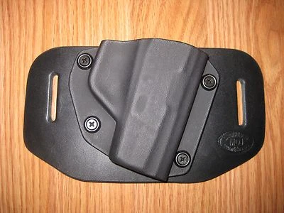 OWB Kydex/Leather Hybrid Holster with adjustable retention for Taurus - Image 1 of 4