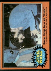 1977 Topps Star Wars #305 Director George Lucas und "Greedo" EX/EX-MT - Bild 1 von 2