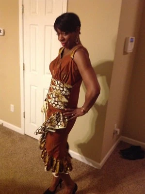 African woman ensemble with ruffles on skirt.size 06 - Image 1 of 3