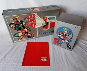 Projector P25 + Box 12 Cassette + Catalogo MUPI - GOLDRAKE GOLDORAK GRENDIZER - Foto 1 di 12