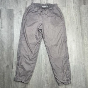 De Colección Nike Pantalones de Pista Para Hombres Bolsillo Medio Tobillo Cremallera Rompevientos Gris Plata Y2K R - Imagen 1 de 14