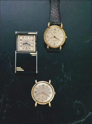 Reloj de viaje plegable de acero dorado Rolex 1989 estampado vintage para hombre reloj placa de arte Foto 1 de 4