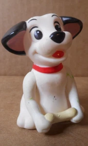 101 Dalmations Lucky Dog hueso amarillo McDonald's juguete de plástico Happy Meal 1990 - Imagen 1 de 9