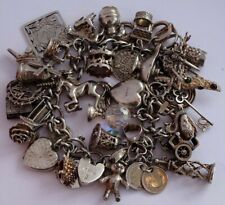 Superb vintage solid silver charm bracelet & 36 charms,opening,moving, 108.1g