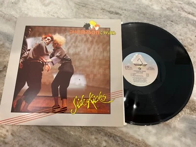 THOMPSON TWINS LP SIDE KICKS  Arista  (AL8-8002) OG STERLING PRESS M/NM 1983 - Image 1 of 3