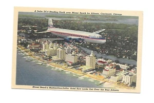 Vintage Postcard DELTA DC-6 over Miami Beach FL Multimillion Dollar Hotel Row - Picture 1 of 2