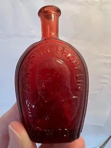 Vintage MINI RUBY RED GLASS BOTTLE FLASK BENJAMIN FRANKLIN MINIATURE WHEATON - Picture 1 of 3
