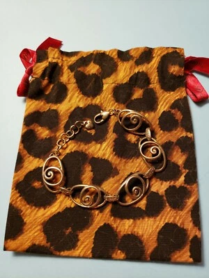 PULSERA BRIGHTON ROCK N SCROLL RETIRADA Y BOLSA CON CUBIERTA ANTIPOLVO BRIGHTON con lazos de seda ❤ Foto 1 de 4