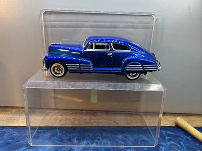 1948 Chevrolet Aerosedan Fleetline Cobalt Blue 1:24 Diecast Model W Acrylic Case - Image 1 of 4