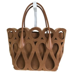 Mary Al Terna Labyrinth Tasche Damen braun Cut Out Leder Beuteltasche Magnetverschluss - Bild 1 von 8