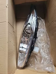 20-201-01122 Left Passenger Side Headlight Headlamp Silver Bezel Bulb DRL Varroc - Picture 1 of 5