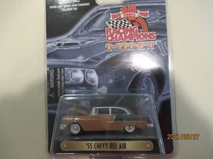 Chevy Bel Air 1955 1:64 Racing Champions Mint dorado y negro - Imagen 1 de 2