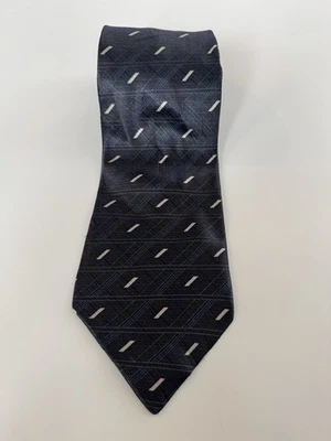 CORBATA DE SEDA GEOMÉTRICA PARA HOMBRE FLECHA AZUL, NEGRA Y PLATEADA Foto 1 de 3