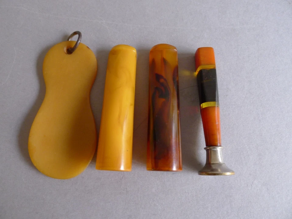 4er Konvolut Bakelit Kunstharz alter Kunststoff Petschaft, Zigarrenspitzen ... - Bild 1 von 4