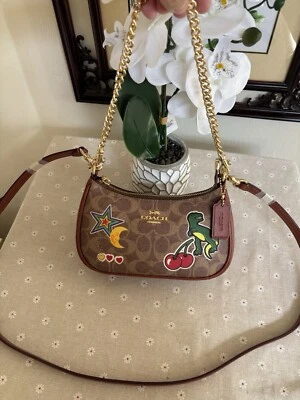 Coach Teri Mini Crossbody Bag In Signature Canvas With Sticker Print - Image 1 of 4