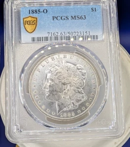 Coin, 1885-O Morgan Silver Dollar PCGS Graded MS63 - Picture 1 of 4