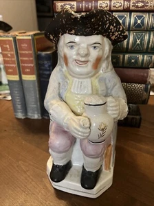 ANTIQUE PASTEL BLUE EYED TOBY JUG WITH PIPE and FLORAL JUG - Picture 1 of 9