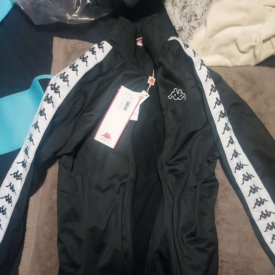 Chaqueta deportiva delgada Kappa 222 Banda Anniston para hombre negra/blanca 301EFU0-AE2 X-Large Foto 1 de 1