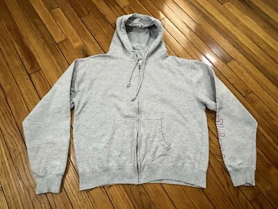 Moletom com capuz Oakley cinza com zíper frontal com rosa "Oakley" na manga GG feminino - Imagem 1 de 4