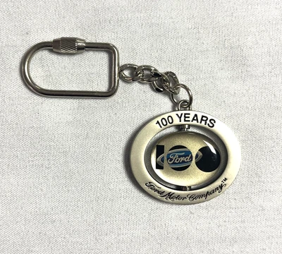 Vintage Ford Motor Company 100 Years Spin Logo Key Chain - Image 1 of 4