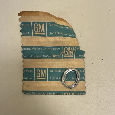 NOS 1977-79 OLDSMOBILE DELTA 88 ELECTRIC POWER ANTENNA BEZEL ESCUTCHEON 556311 - Image 1 of 3