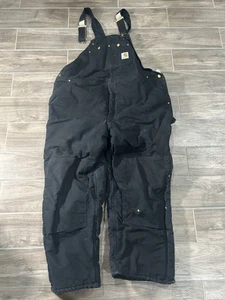 Mono con tirantes de pato forrado acolchado ártico Carhartt R03 de colección para hombre talla 48 x 30 negro trabajo - Imagen 1 de 10