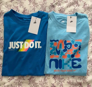 Lot of two Nike Short Sleeve T Shirt For Kids Size XL. Value $50 - Picture 1 of 3