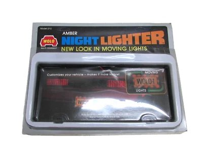 VINTAGE! WOLO NIGHT LIGHTER LF-2, MOVING LIGHTS LICENSE PLATE FRAME - Image 1 of 4