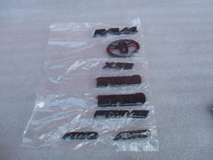 2019-2024 TOYOTA RAV4 XLE AWD BLACKOUT EMBLEM OVERLAY KIT GEN OEM PT948-42193-02 - Picture 1 of 7