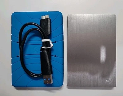 Seagate Backup Plus Slim 2TB Hard Drive with Case - Silver - Image 1 of 4