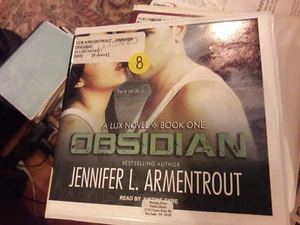 2 Audiobooks: Obsidian - Jennifer Arment & Obsidian Blade - Pete Hautman - Picture 1 of 2
