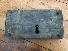 very old door lock ( could be church ) heavy old wood and handmade nails