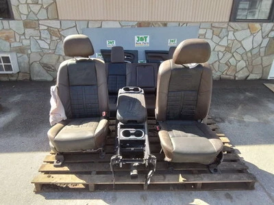 2017 TITAN PLATINUM RESERVE FRONT AND REAR LEATHER SEATS CREWCAB CONSOLE - Image 1 of 4