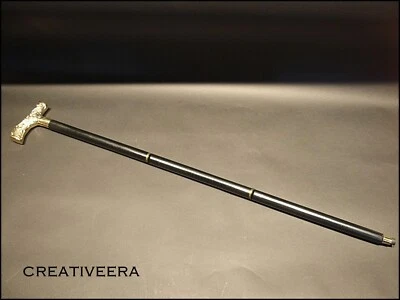 Antiguo bastón de madera negro con mango de cabeza de arte real estilo derby vintage Foto 1 de 4