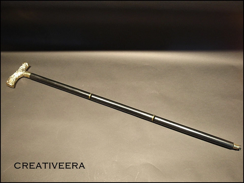 Antiguo bastón de madera negro con mango de cabeza de arte real estilo derby vintage Foto 1 de 4