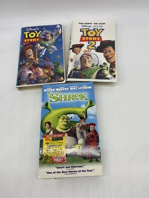Toy Story 1 & 2 Walt Disney Pixar + Shrek VHS Tapes Movie lot of 3 Clamshell Foto 1 de 4