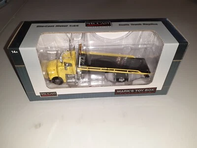 NIB 1/64 Custom Yellow Pete 385 Rollback Tow Truck SpecCast - Image 1 of 4