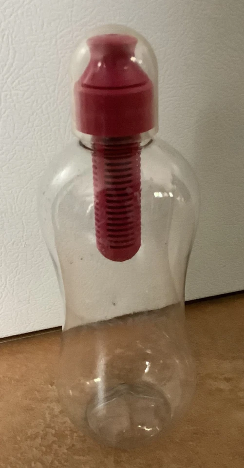 BOTELLA BOBBLE con tapa de boquilla rosa -- Filtros mientras bebes - Usada Foto 1 de 2