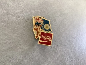 Cayman Islands 1988 Summer Olympic Games Coca-Cola Hodori Tiger Flag Pin-NEW - Picture 1 of 2