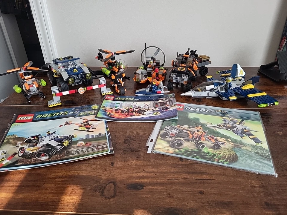Lego Agents Lot : Gold Hunt, 4 Wheeling Pursuit, River Chase, Helicopter, Bike - Image 1 of 4