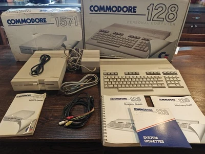Computadora Commodore 128, unidad de disco 1571 serie cajas a juego cables y manuales Foto 1 de 4
