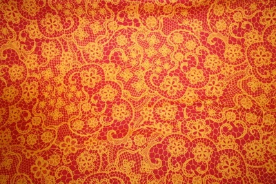 ENCAJE NARANJA SOBRE ROJO DE PATRICK LOSE - TELA 100% ALGODÓN Foto 1 de 4