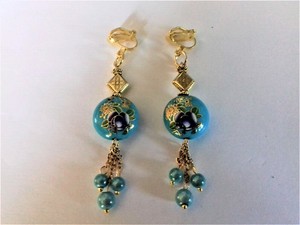 Boucles d'oreilles à clips longues  cabochon fleuri