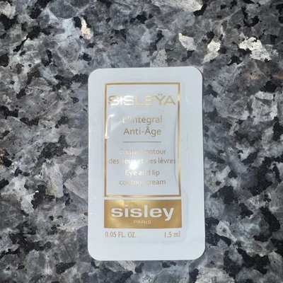 Paquete de muestra de crema antiedad Sisley Sisleya L'Integral día y noche .05 fl oz Foto 1 de 2