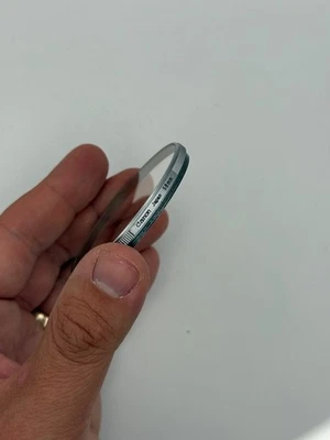 Canon UV 58mm Lens Filter Silver Chrome - Image 1 of 3