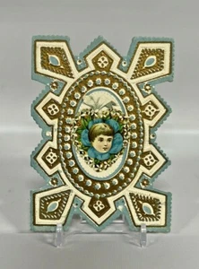 Victorian Card Embossed Little Girls Face On Flower - Picture 1 of 2