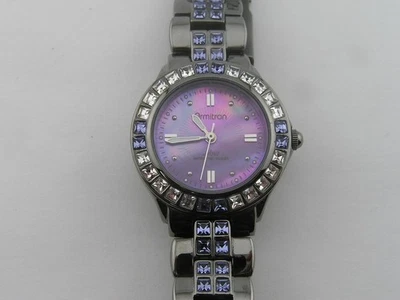 Reloj vintage Armitron Now para dama esfera púrpura bisel multicolor funcionando Foto 1 de 4
