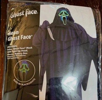 Disfraz Spirit Halloween Adulto Cara Fantasma Iluminado Neón Luz Negra OSFM Foto 1 de 4