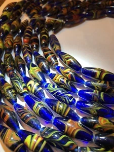 Blu semitradotto vintage 15,5" con perline in piuma fiamme vetro arancione e giallo - Foto 1 di 9